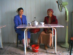 Two Uyghur women at tea. Kashgar, Xinjiang.