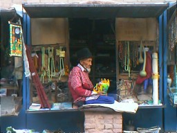 Seller of Beads and Amulets. Kashgar, Xinjiang.