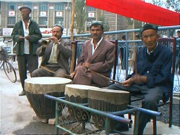 The Uyghur narda or tassa drum is not as sophisticated as the tassa in Trinidad as it is only the rhythm instrument supporting the horn. Kashgar, Xinjiang.