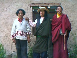 Three brothers, three faces of Tibet. (left to right) Snantashi, 21, the modern Tibetan; Jamyangworsal, 20, the traditional Khamba and Seradowa, 23, the Tibetan Buddhist monk.  Xiewu, Qinghai.