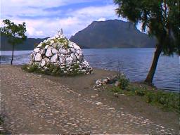 A Tibetan chorten on the shore of Lugu Lake