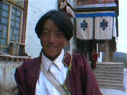 Buddhists generally only go to the monastery at festivals, on pilgrimage or to ask for favours such as success in exams or for a male child. This young Tibetan was praying for work in western Sichuan, an area where unemployment has reached an estimated 20%.  Ganzi Lamasery, Sichuan