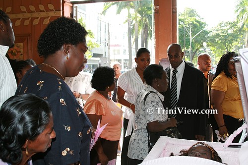 Onlookers view the body
