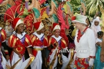 Queen Elizabeth II greets children at Queen's Hall