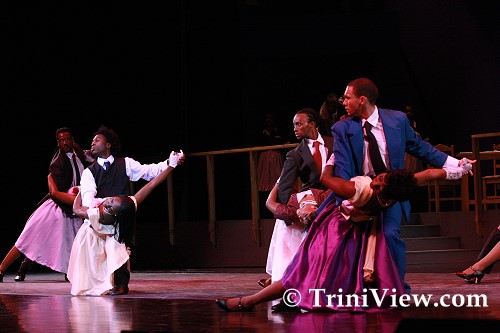 Members of the cast ballroom dance