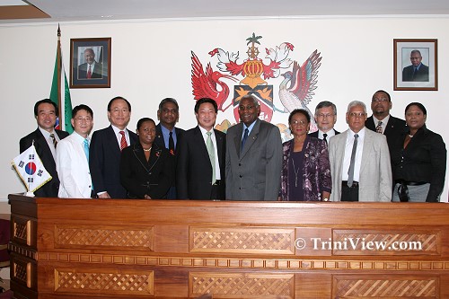 Members of the South Korean consulate and Councillors of the City of Port of Spain