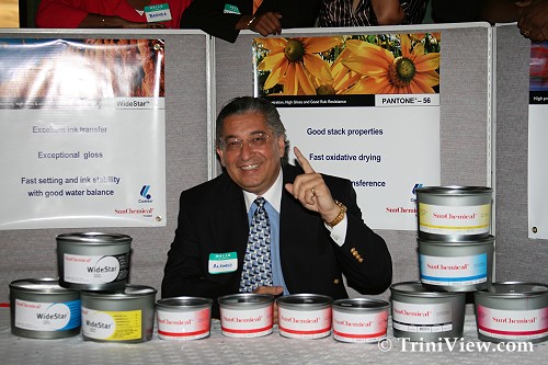 Marketing Vice President Alfonso Paredes with Sun Chemical products