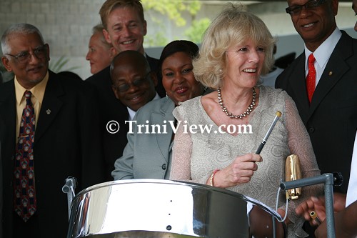 Camilla the Duchess of Cornwall attempts to play the Steelpan