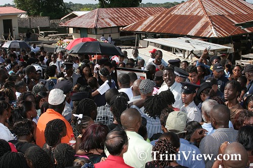 Viewing the body at the cemetery