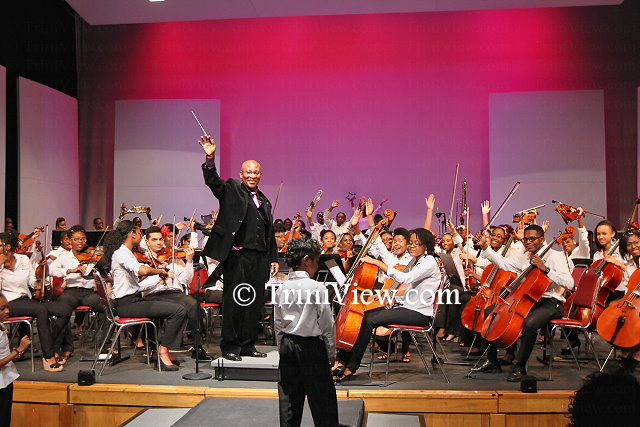 Members of SACO and TTYP with music director Mr. Kenneth Listhrop