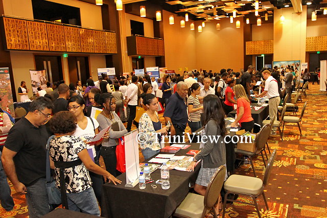 College recruiters assisting students and parents at the the 2014 College Fair