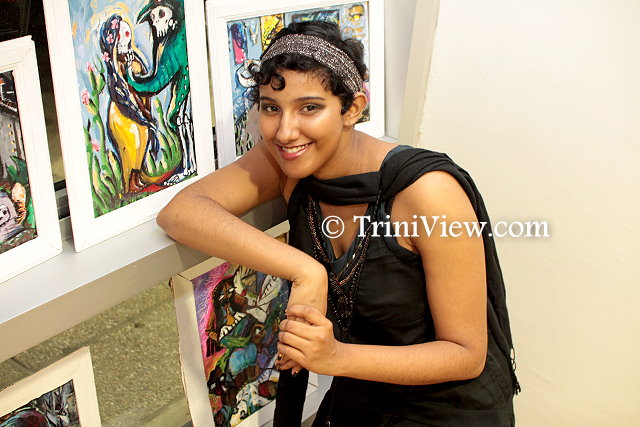 Artist, Maya Ramesar displays some of her paintings