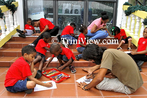 Shaun de Luna and some of the kids from the Marguerite Educational Centre having fun on the opening day