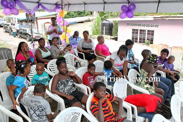 Residents of Scorpion Alley, Carenage at the Christmas get-together