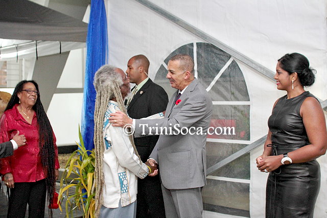 President Anthony Carmona and his wife, Reema Carmona greet veteran calypsonian Emerald 'Brother Valentino' Phillip