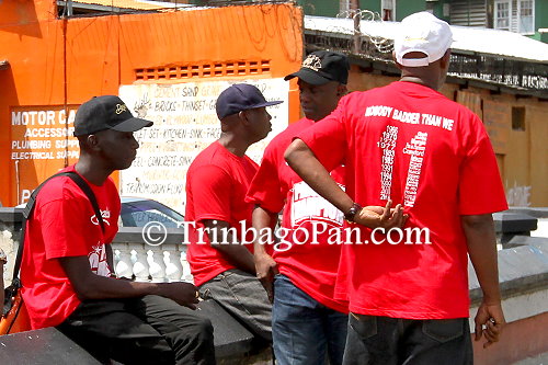 Members of Despers in their red t-shirts signifying the band's eleventh National Panorama Competition victory