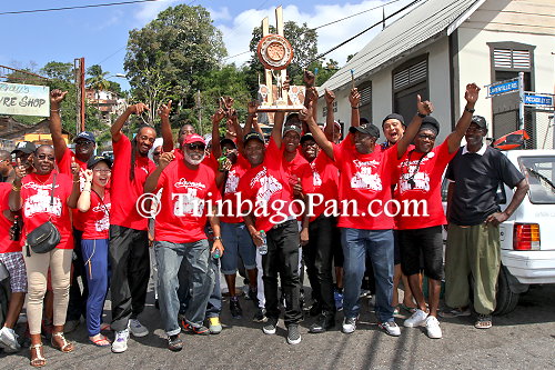 Despers band members and supporters share a victory photo moment before the motorcade