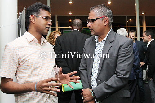 (Right) Minister Clarence Rambharat and former SWMCOL CEO Ronald Roach