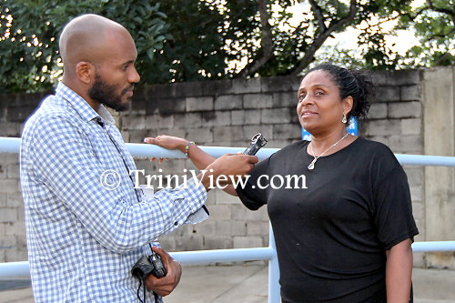 Heather Henderson-Gordon being interviewed by a TriniView.com reporter