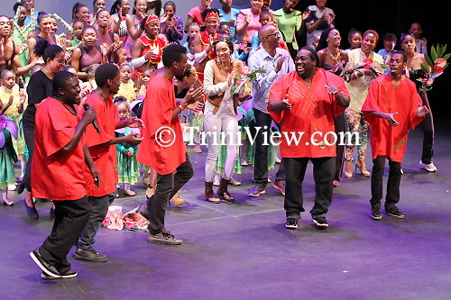 Henderson-Gordon and her production crew on stage