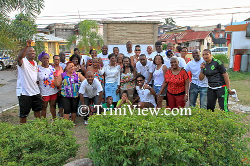 Members of the Palo's Crew (white jerseys) and mothers of the Mango Rose community