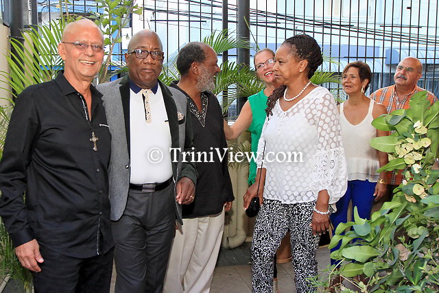 Exodus Steel Orchestra's Manager Ainsworth Mohammed, Junior Hutson and guests