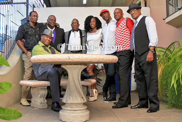 L: Devon Ocho, guitarist; Jason 'Fridge' Seecharan, vocalist; Junior Hutson, honorary member; Moricia Cagan, vocalist; Nigel O'Connor, vocalist; Oslyn Pompie, bass player and Pelham Goddard, band leader and key boardist. (Sitting): Vonrick Maynard, drummer