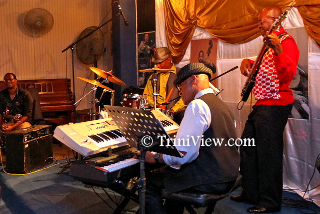 Devon Ocho, guitarist, Vonrick Maynard on the drums, Oslyn Pompie bass player and band leader, Pelham Goddard on the keyboard