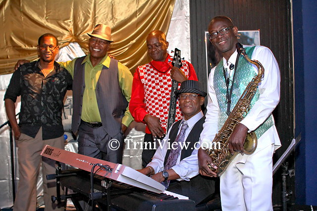 Devon Ocho, guitarist; Vonrick Maynard, drummer; Oslyn Pompie, bass player; Pelham Goddard band leader on the keyboard and saxophonist, Malcolm Boyce