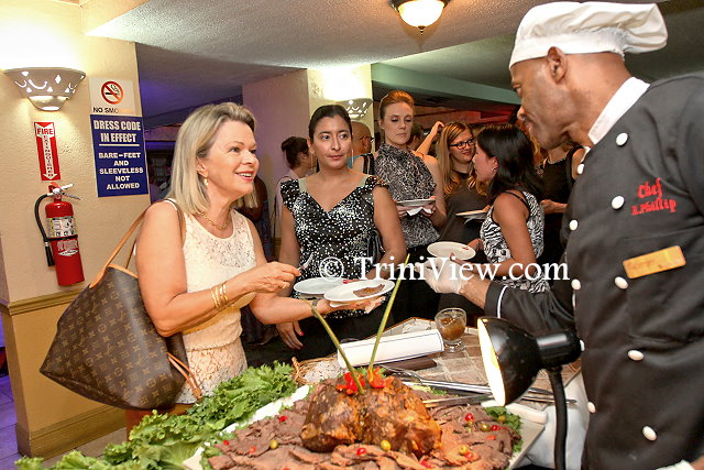 Guests being served dinner at the reception