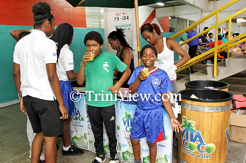 Students enjoy a glass of refreshing Vita Coco, coconut water