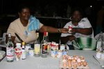 Left: Edris Williams and Stella Gentle making ponche-de-creme